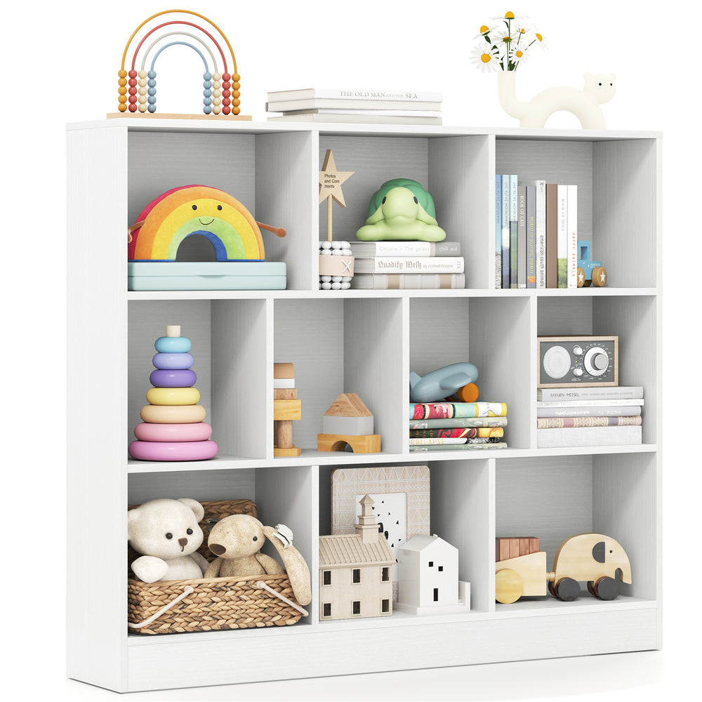 Wooden toy storage organizer in white with decorative items displayed on top, perfect for kids' rooms and organization.