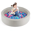 Round foam ball pit with 25D sponge filling, gray PU cover, and 200 colorful ocean balls for toddlers' indoor play.