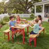 Kids enjoying playtime at a 43.5-inch folding picnic table and bench set, featuring a rustic wooden top and sturdy red.