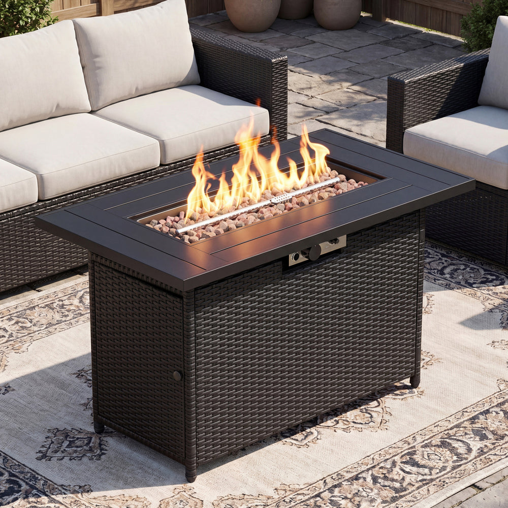 Detail view of the 44.5-inch propane fire pit table showing the premium PE rattan texture and stainless steel burner.