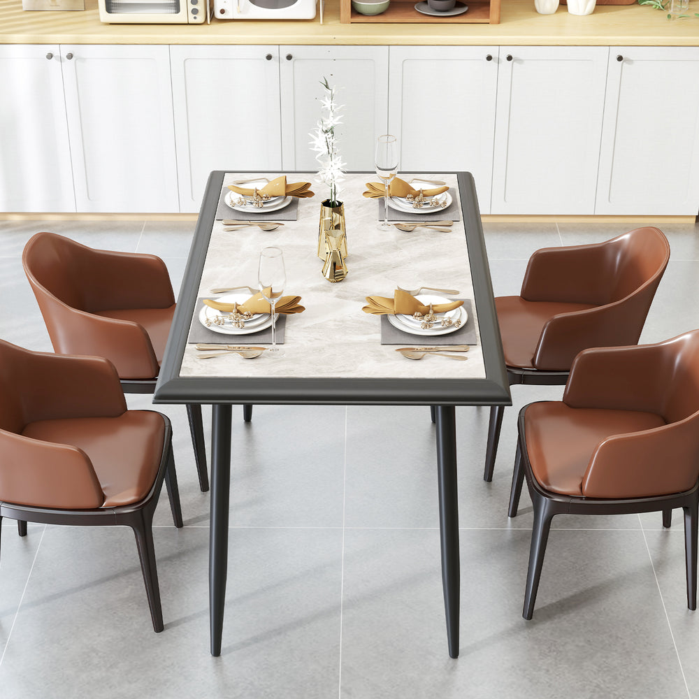 Sintered stone dining table with golden metal frame, stylish faux marble top, perfect for indoor dining and gatherings.