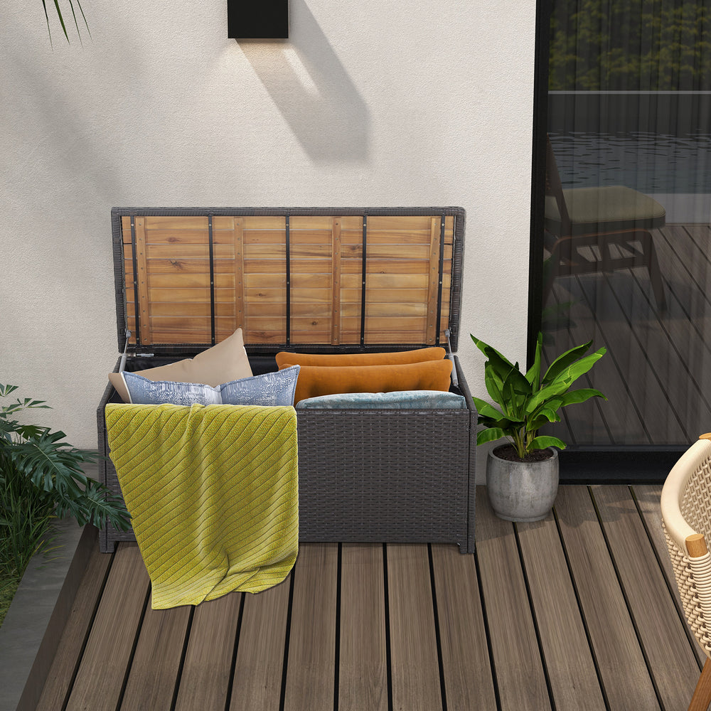 Outdoor storage bench with acacia wood lid, 45-gallon capacity, and zippered liner for patio organization.