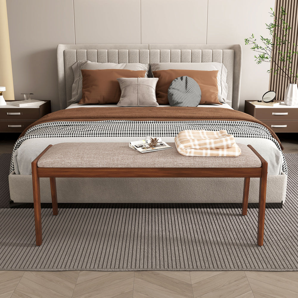 Beige 45-inch farmhouse backless bench with rubber wood legs and padded seat, perfect for bedroom or dining room use.