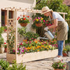Wooden raised garden bed with side trellis and hanging roof, perfect for growing flowers and plants in outdoor spaces.