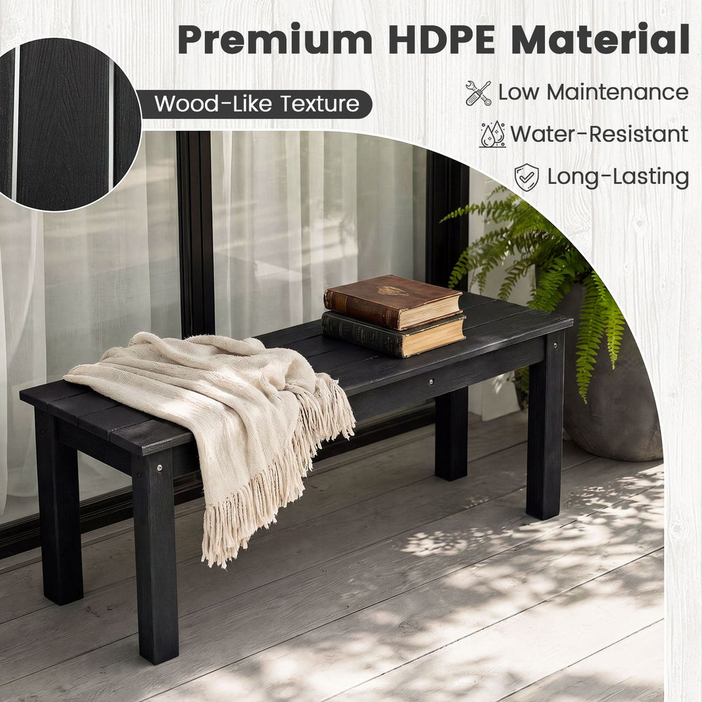 Black 45" outdoor HDPE bench with slatted seat design, 660 lbs capacity, perfect for patios and gardens.
