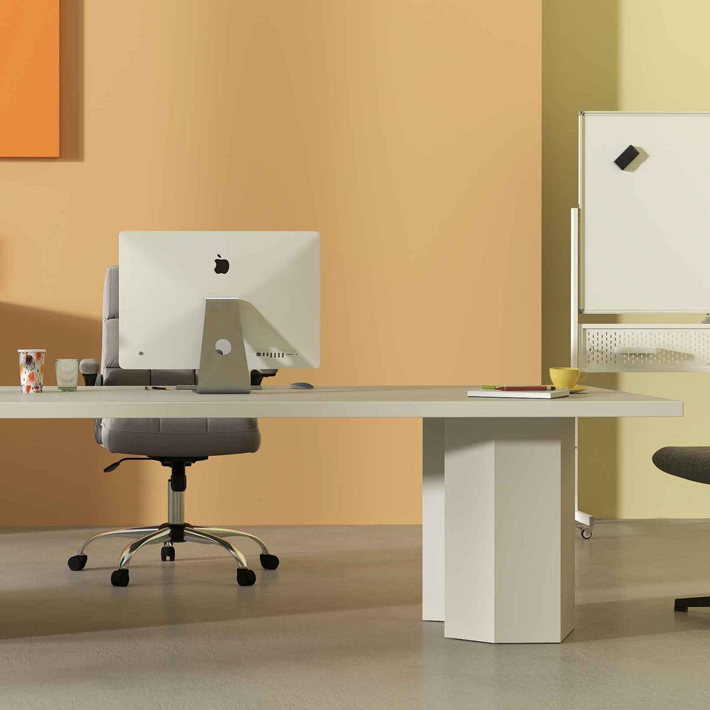 Mobile whiteboard and linen upholstered executive chair in a stylish office setting for versatile use and comfort.