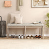 Upholstered bench with carved rubber wood legs, beige padded seat, ideal for entryway or living room seating.