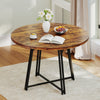 Round 47-inch dining table in rustic brown with cross base, seating 4-6 people, perfect for stylish kitchen dining.