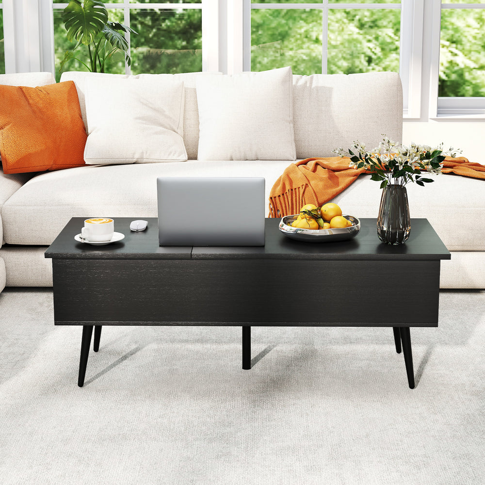Lift top coffee table in black with two hidden compartments, ideal for storage and convenience in living room settings.