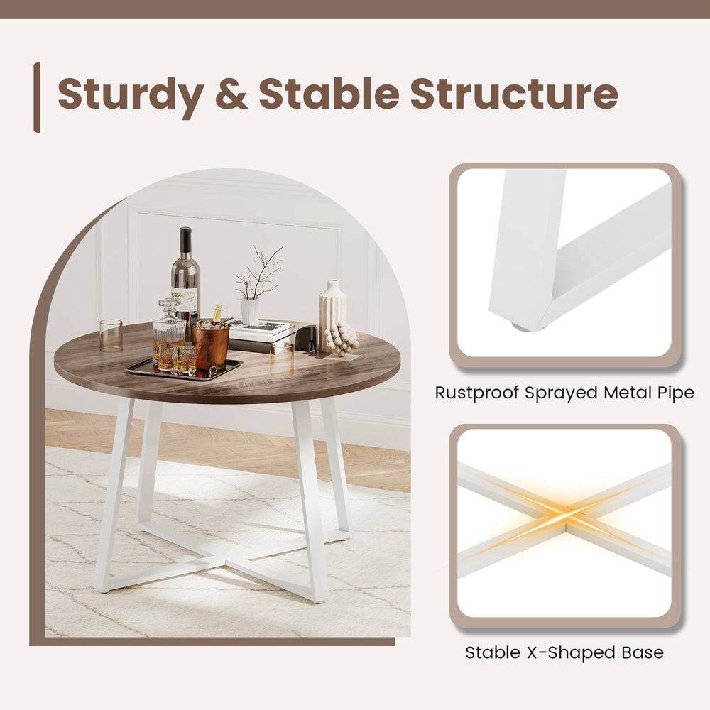 Round 47-inch dining table with a natural wood-grain surface and stable X-shaped base, ideal for various settings.
