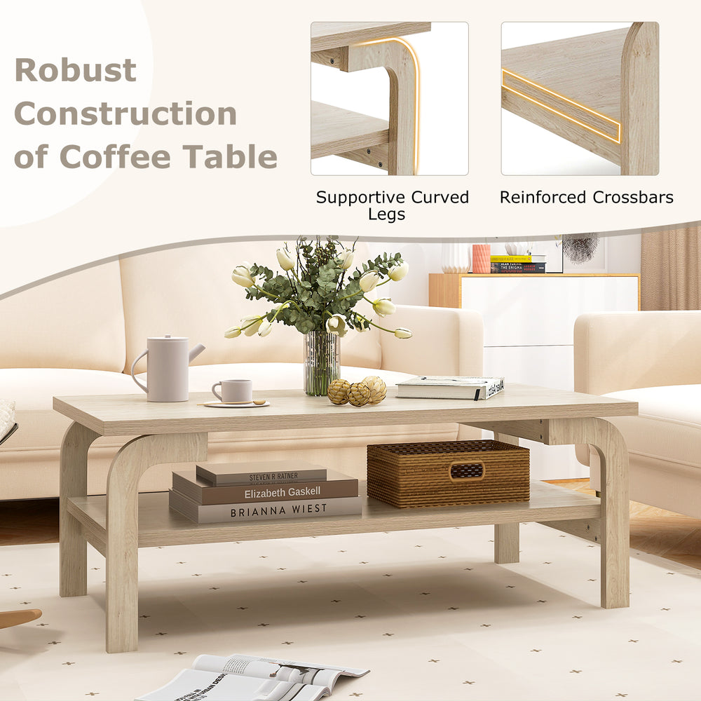 Accent rectangular coffee table with supportive curved legs and open shelves, ideal for living room gatherings.