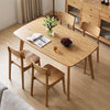 Natural solid wood dining table measuring 47 inches, featuring smooth rounded edges, ideal for family gatherings and daily use.