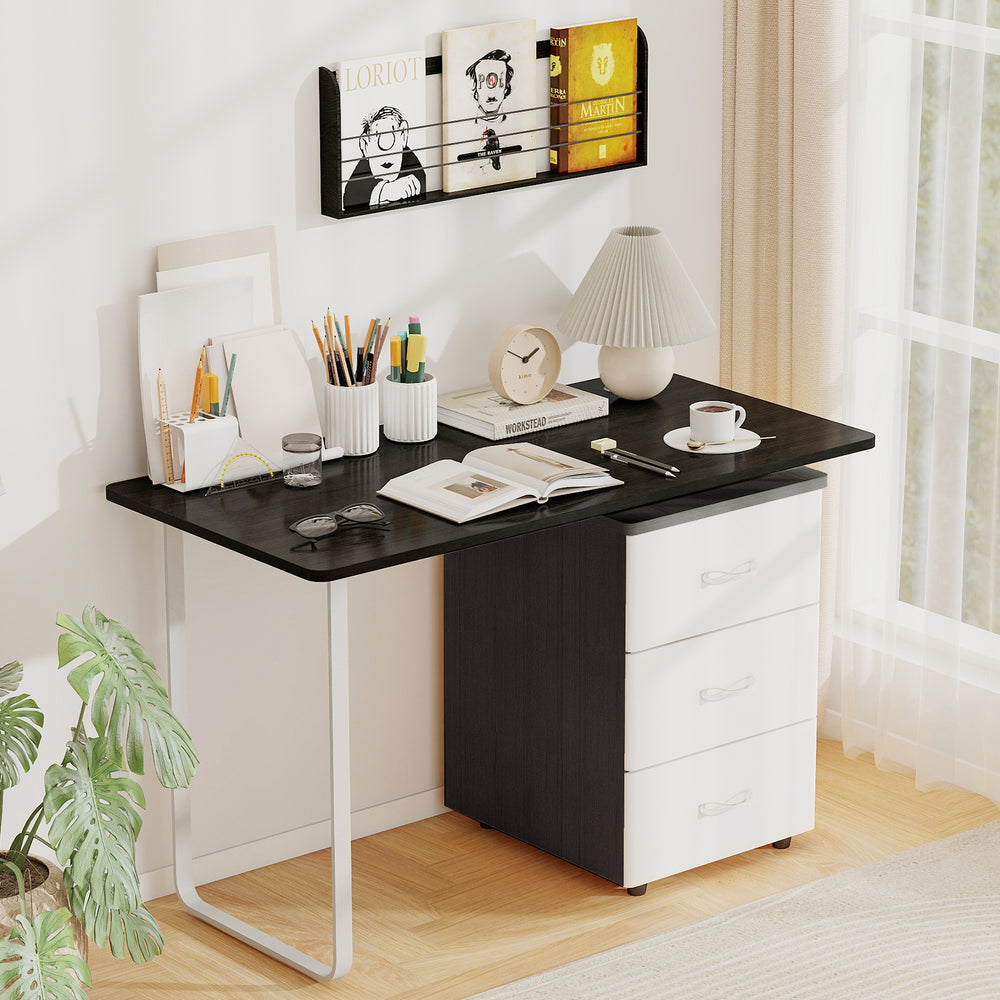 Black 47” x 24” universal tabletop with dual cable holes, ideal for standard and standing desk frames.