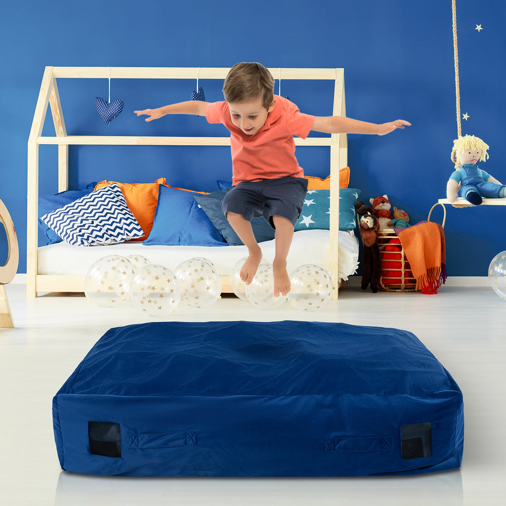 Blue crash pad sensory mat with foam blocks, ideal for safe play and relaxation for kids and pets.
