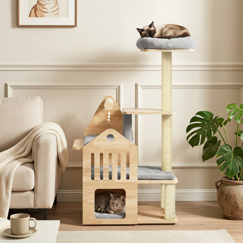Multi-level solid wood cat tree features a padded top perch, cat condo, and sisal scratching posts for indoor cats.