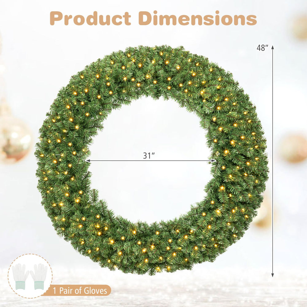 Large 48-inch pre-lit Christmas wreath with 200 warm white LED lights, featuring a realistic spruce design for festive decor.