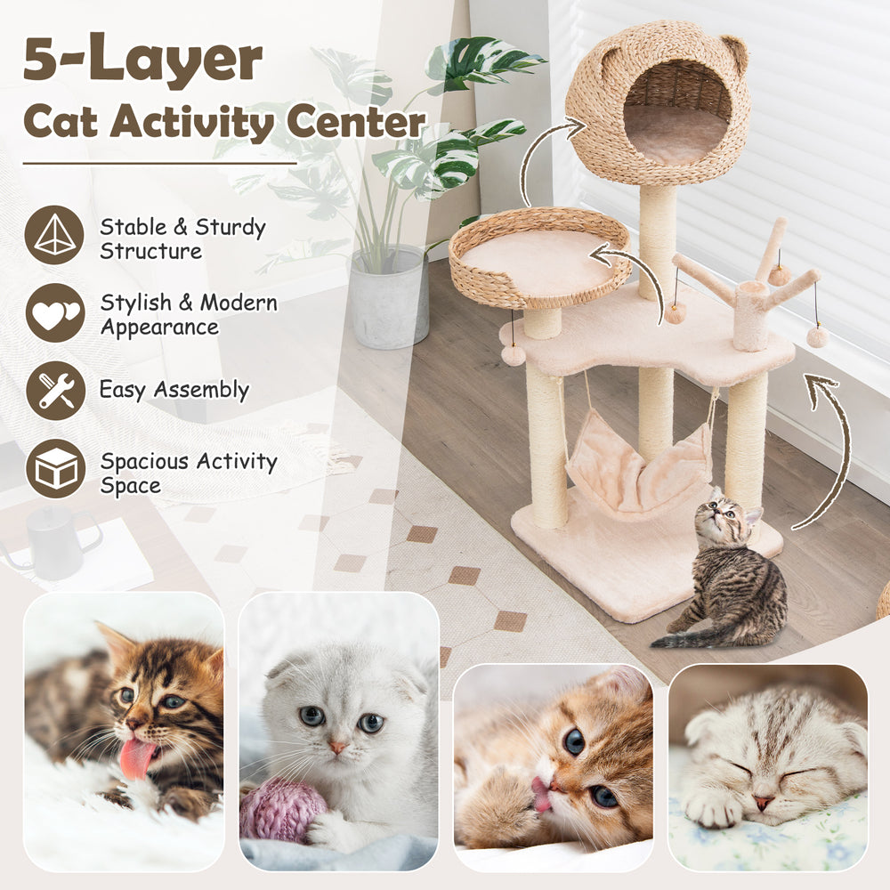 Multi-level cat tree with condo hammock, plush cushion, and hanging balls, perfect for climbing and lounging.