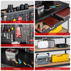 Workbench featuring a pegboard with tools, two drawers, and spacious tabletop for organized storage and project.