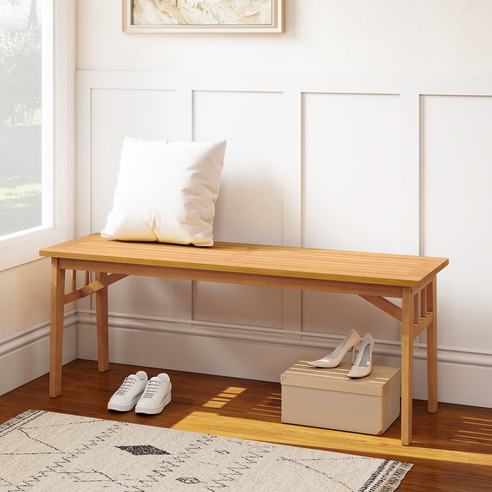 Acacia wood bench with slat seat, stable triangular structure, perfect for garden or entryway use.