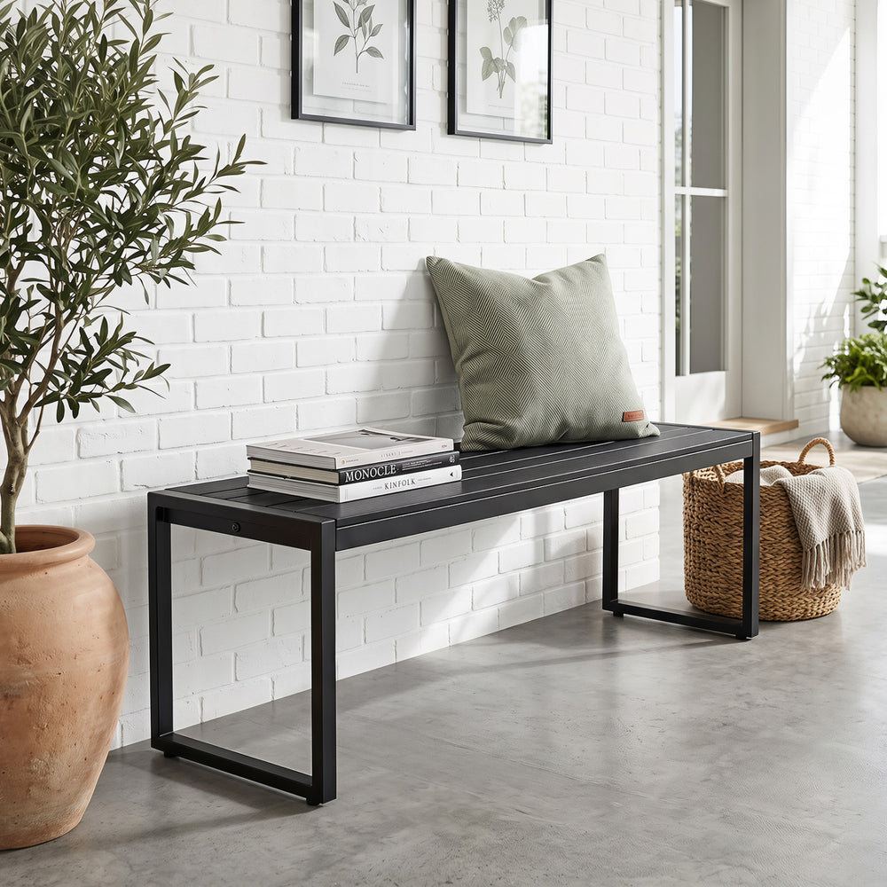 Black 48" outdoor bench with wood-plastic composite slatted seat and metal frame, perfect for gardens and patios.