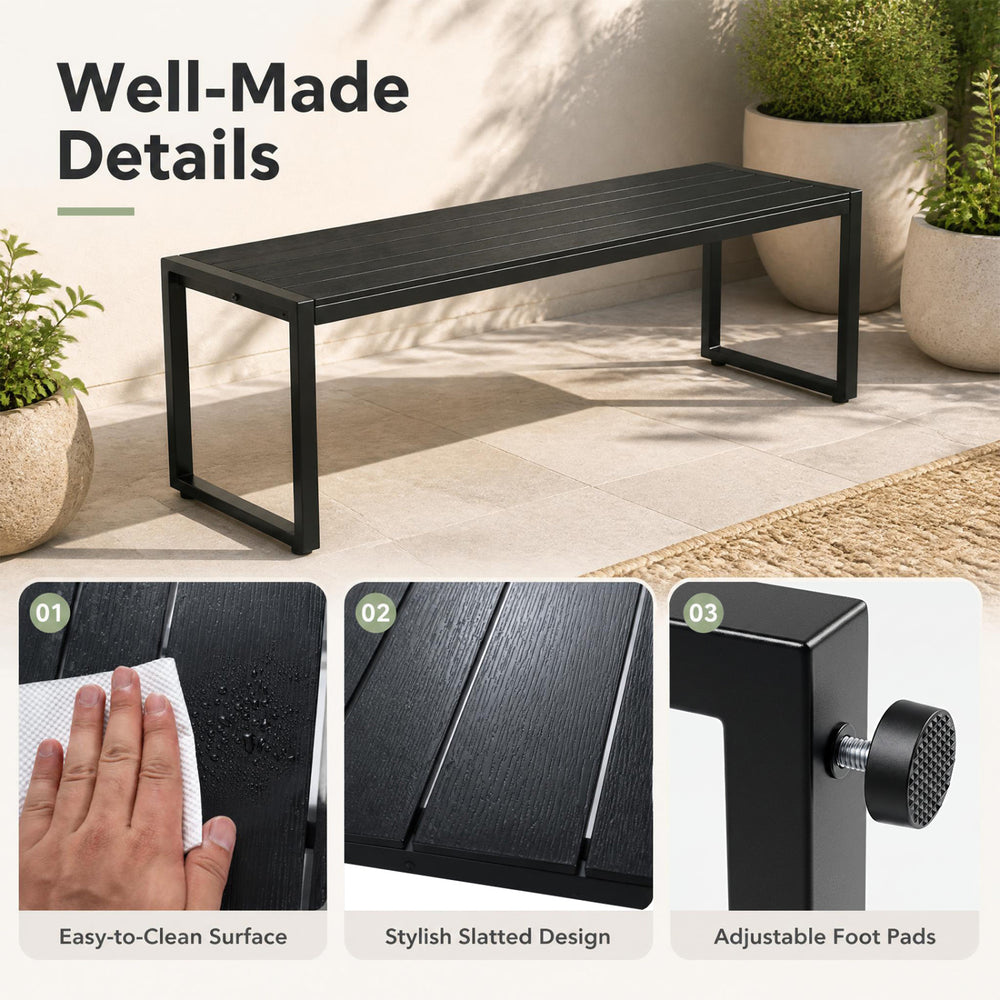 Stylish 48" outdoor bench in black with a wood-plastic composite slatted seat, perfect for garden gatherings and easy maintenance.
