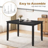 48" rectangular kitchen table in black with solid rubber wood legs, comfortably seating 4 people for dining.