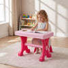 Pink kids' table with a closed lid, featuring a sturdy stool and a removable keyboard for versatile musical play.
