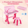 Kids electric piano keyboard toy in pink with 49 keys, stool, microphone, and LED lights for interactive play.