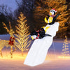 4 feet Christmas penguin decor on a snowy slide with 130 LED lights, perfect for festive indoor or outdoor decoration.