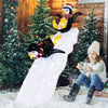 Christmas penguin decor with snowy slide, featuring 130 LED lights, perfect for indoor or outdoor holiday decoration.