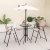 Outdoor bar set featuring a round glass table, two folding chairs, and a beige umbrella for stylish patio dining.