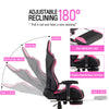 Massage gaming chair in pink with adjustable 180° reclining backrest and retractable footrest for ultimate relaxation.