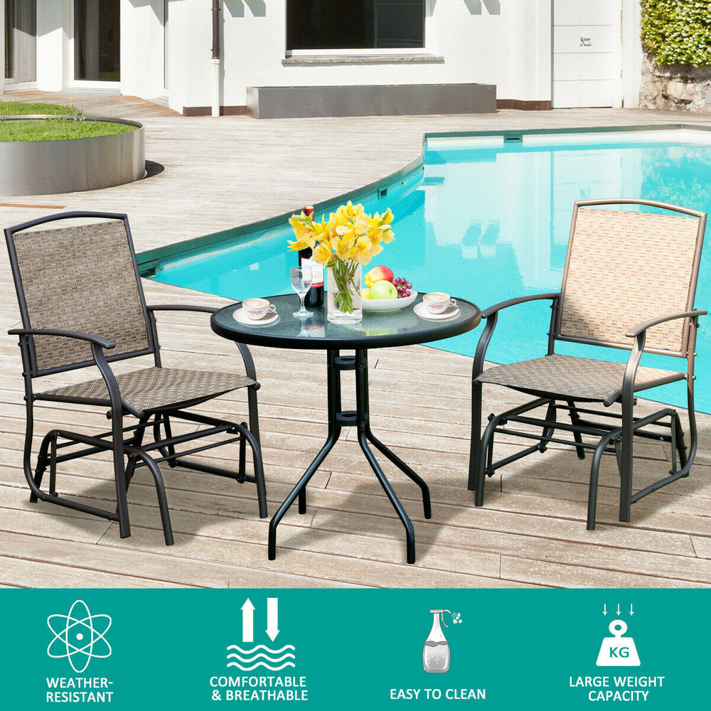 Close-up of the breathable fabric seat and sturdy iron frame of a patio glider chair, perfect for outdoor relaxation.