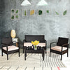 4-piece patio rattan conversation set featuring a loveseat, two chairs, and a coffee table with beige cushions for.