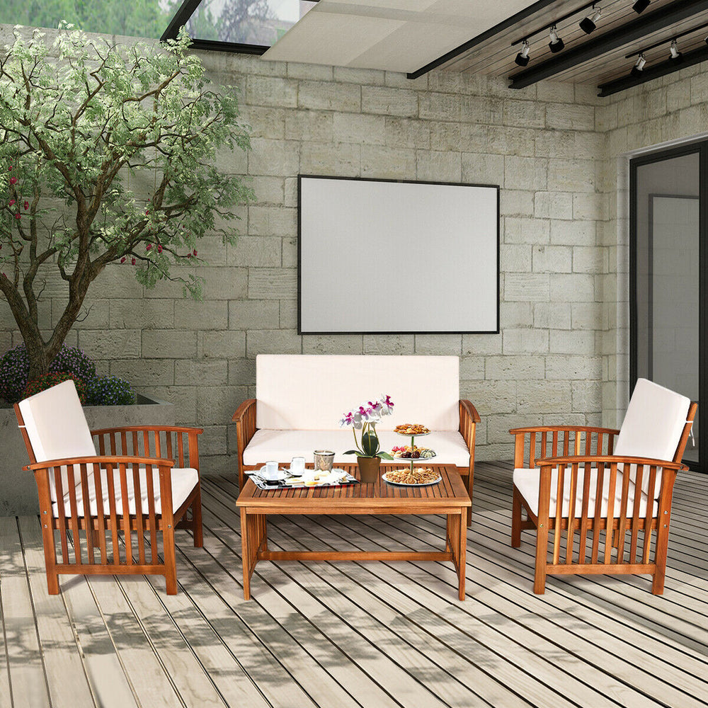 4-piece patio furniture set featuring acacia wood frame and beige cushions, perfect for garden or balcony relaxation.