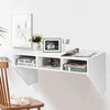 Wall-mounted floating desk in white showcasing tilting legs for added safety, perfect for modern home or office decor.