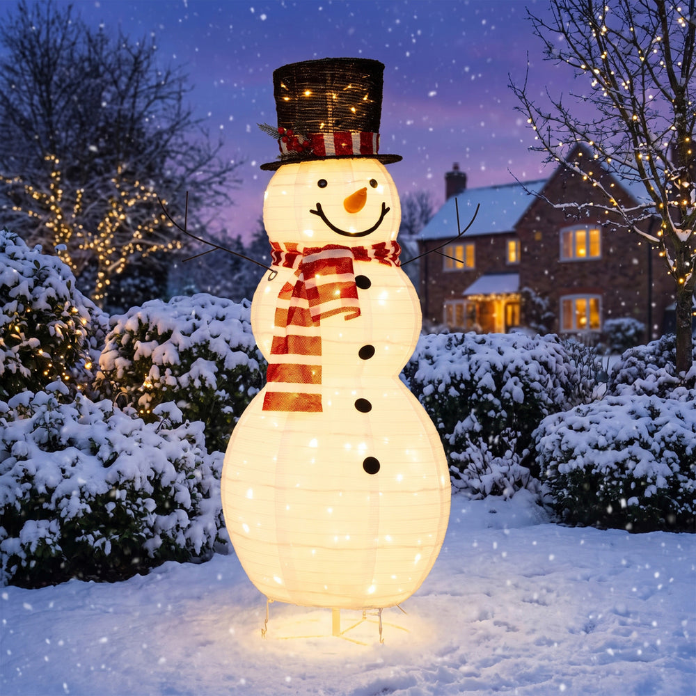 Lighted 4.2 ft Christmas snowman decoration with 120 LED lights, ideal for outdoor holiday displays and winter charm.