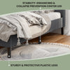 Close-up of the gray platform bed's tufted headboard and sturdy plastic legs, designed for stability and style.