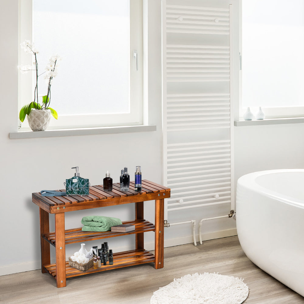 Freestanding wood bench with three-tier storage shelves, made of acacia wood, perfect for bathroom or entryway use.