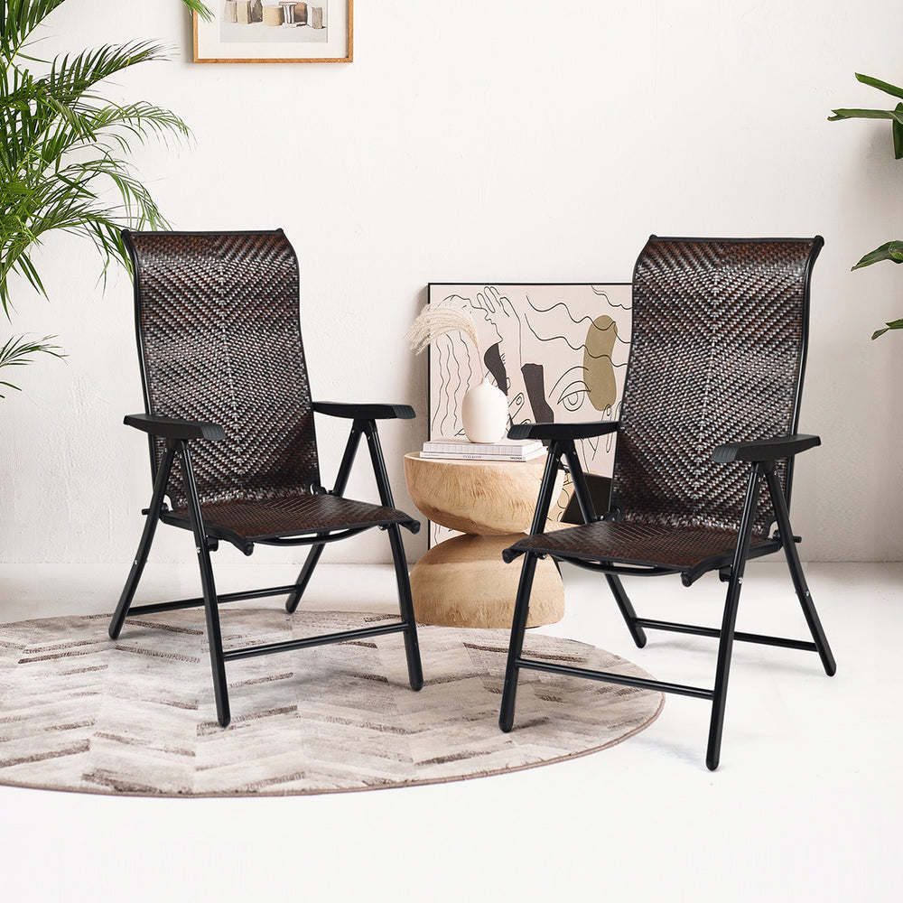 Two folding reclining chairs made of durable PE rattan and steel, ideal for outdoor patio and garden relaxation.