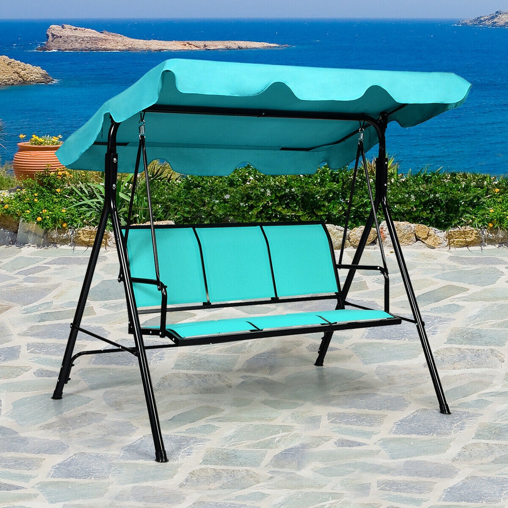 Three-person outdoor patio swing bench chair with adjustable canopy in blue, perfect for relaxing in gardens or by the.