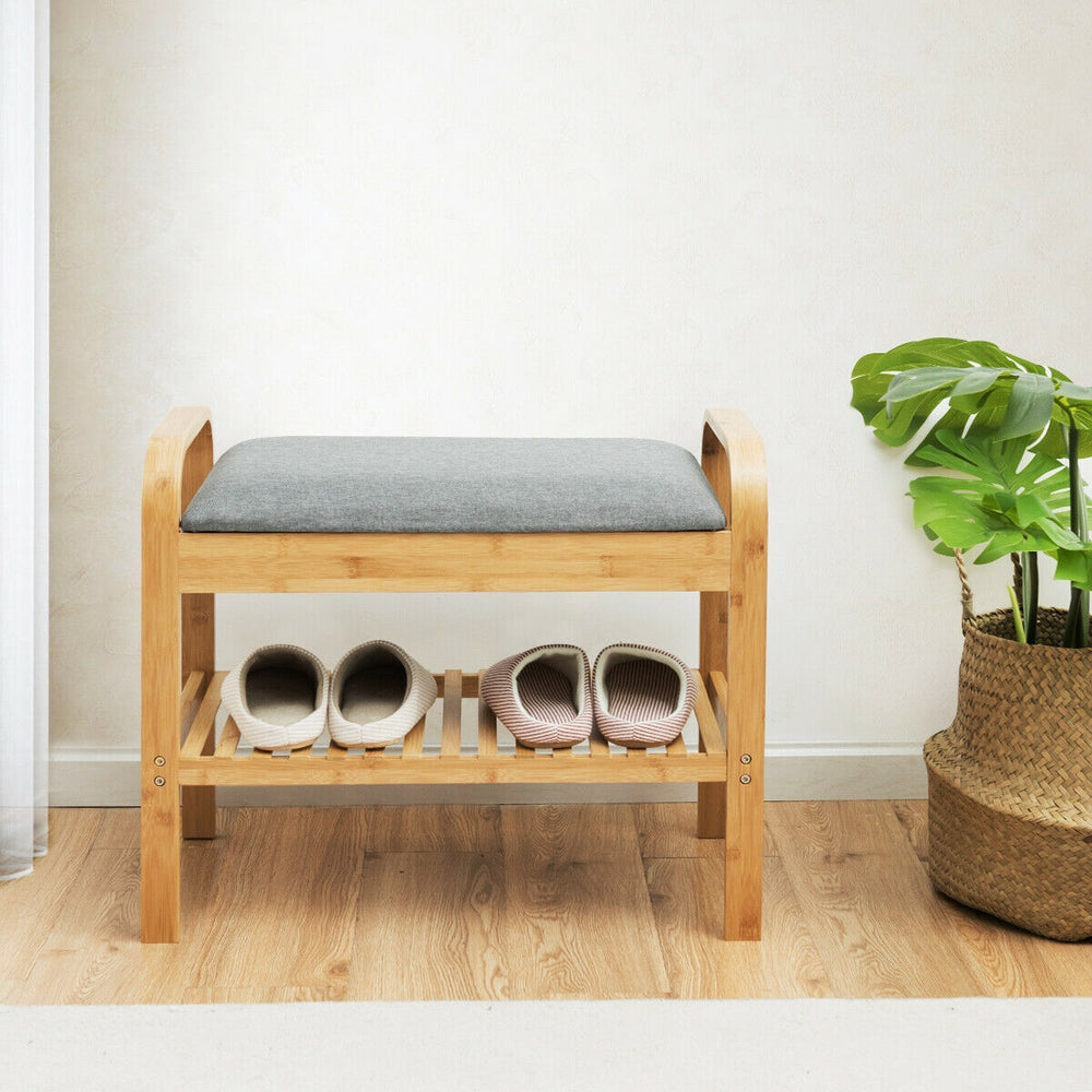 Bamboo shoe rack bench with gray cushion, featuring a lower shelf for storage, perfect for entryway or hallway use.