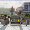 4-piece patio rattan furniture set with gray cushions, including loveseat, two single sofas, and coffee table for.
