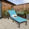 Turquoise outdoor rattan chaise lounge chair with adjustable backrest and soft cushion, perfect for sunbathing on.