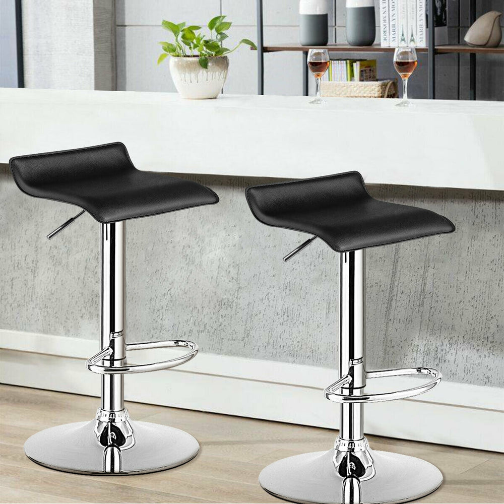 Black PU leather backless bar stool with a chrome base and sleek design, ideal for modern kitchen or bar settings.