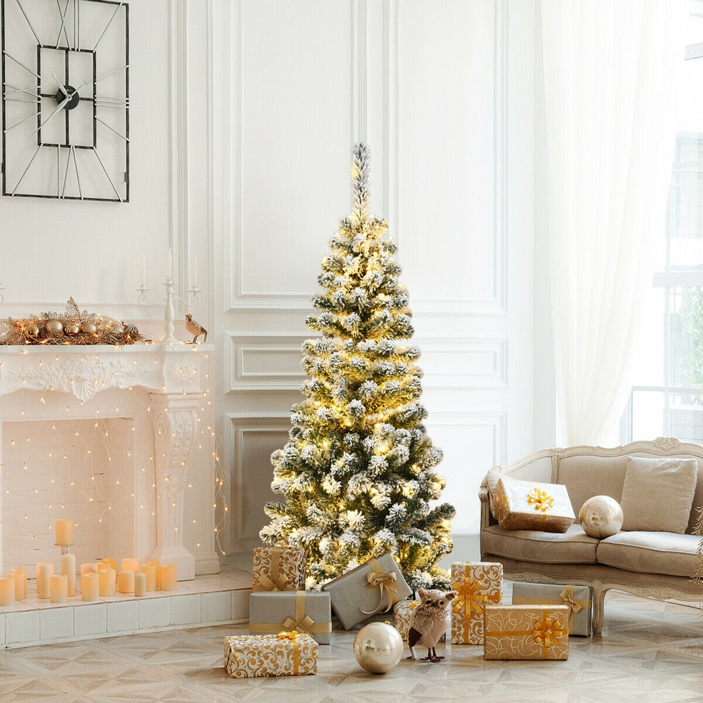 Pre-lit snow flocked pencil Christmas tree with 150 warm LED lights, perfect for small spaces and festive decor.