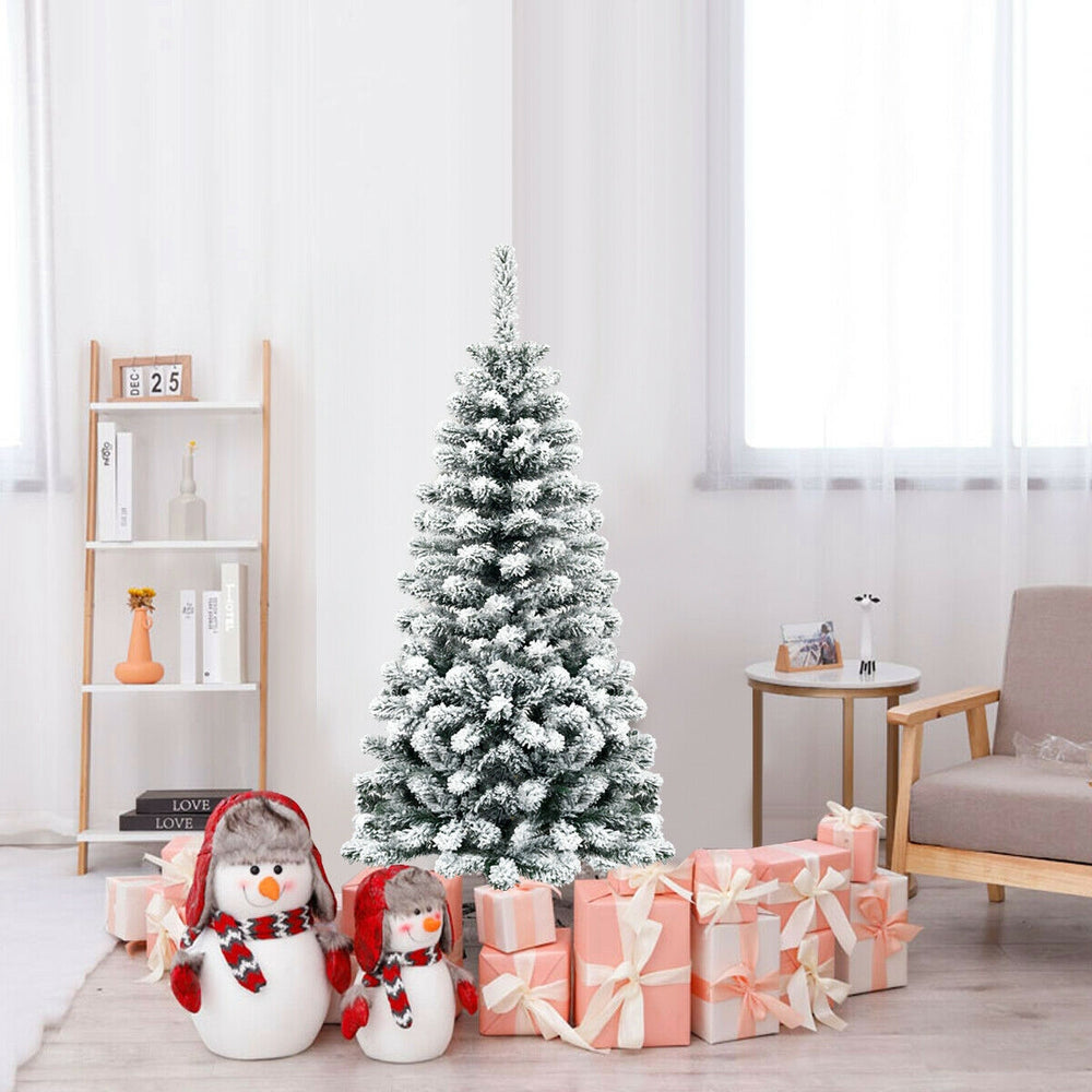 Snow flocked 4.5 feet pencil Christmas tree with 242 branch tips, ideal for festive corner displays in homes or shops.