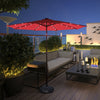Dark red 10' solar LED lighted patio umbrella with tilt adjustment, perfect for outdoor shading and evening ambiance.