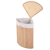 Corner bamboo laundry hamper with a natural finish, featuring a removable liner and PU leather handles for easy.