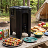 Insulated black beverage dispenser with handles and drip-proof faucet, ideal for outdoor gatherings and picnics.